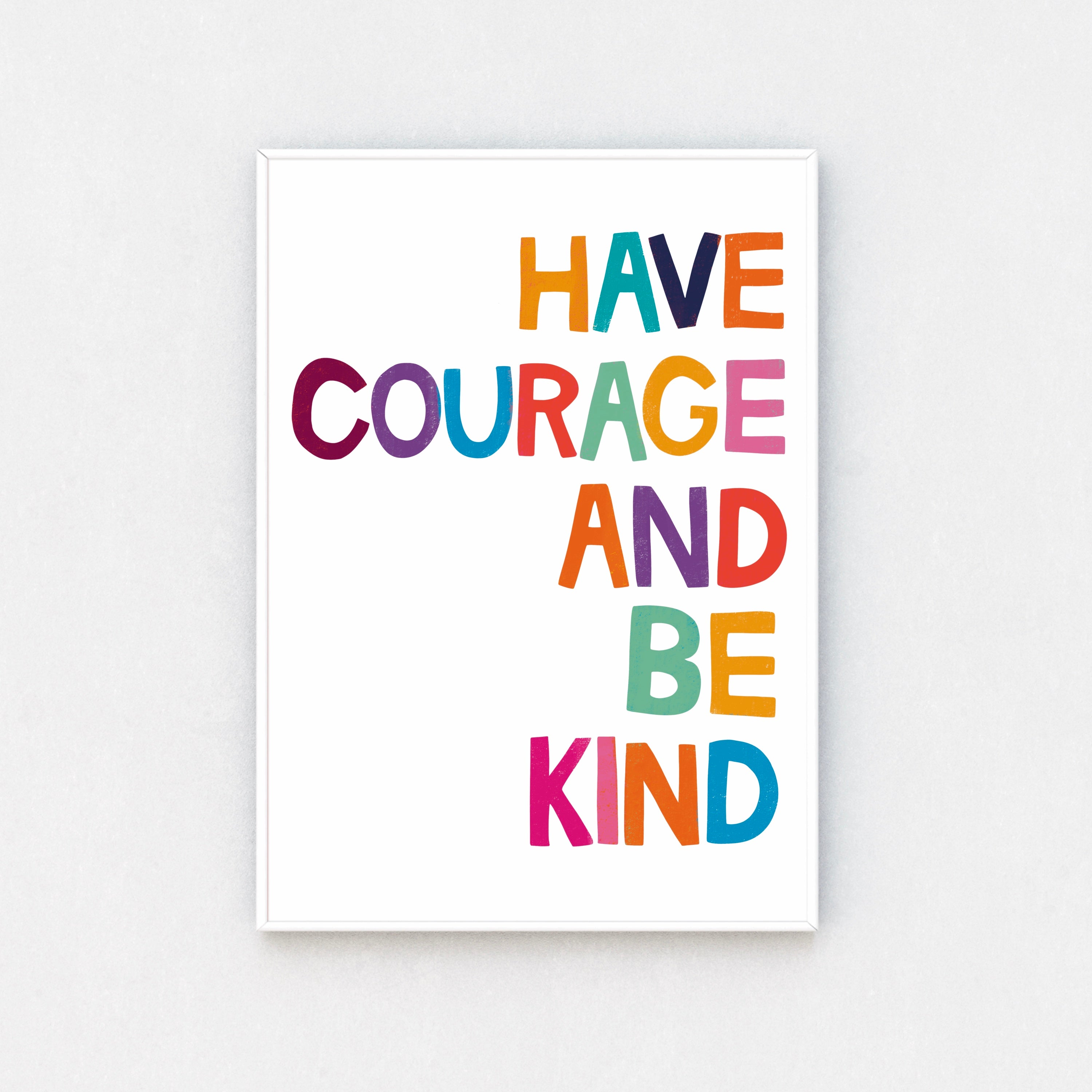 Typography Print in White Frame: Add a dose of positivity to your walls with this framed print featuring the quote "Have Courage and Be Kind." Against a white background, it's a visual reminder to spread kindness.