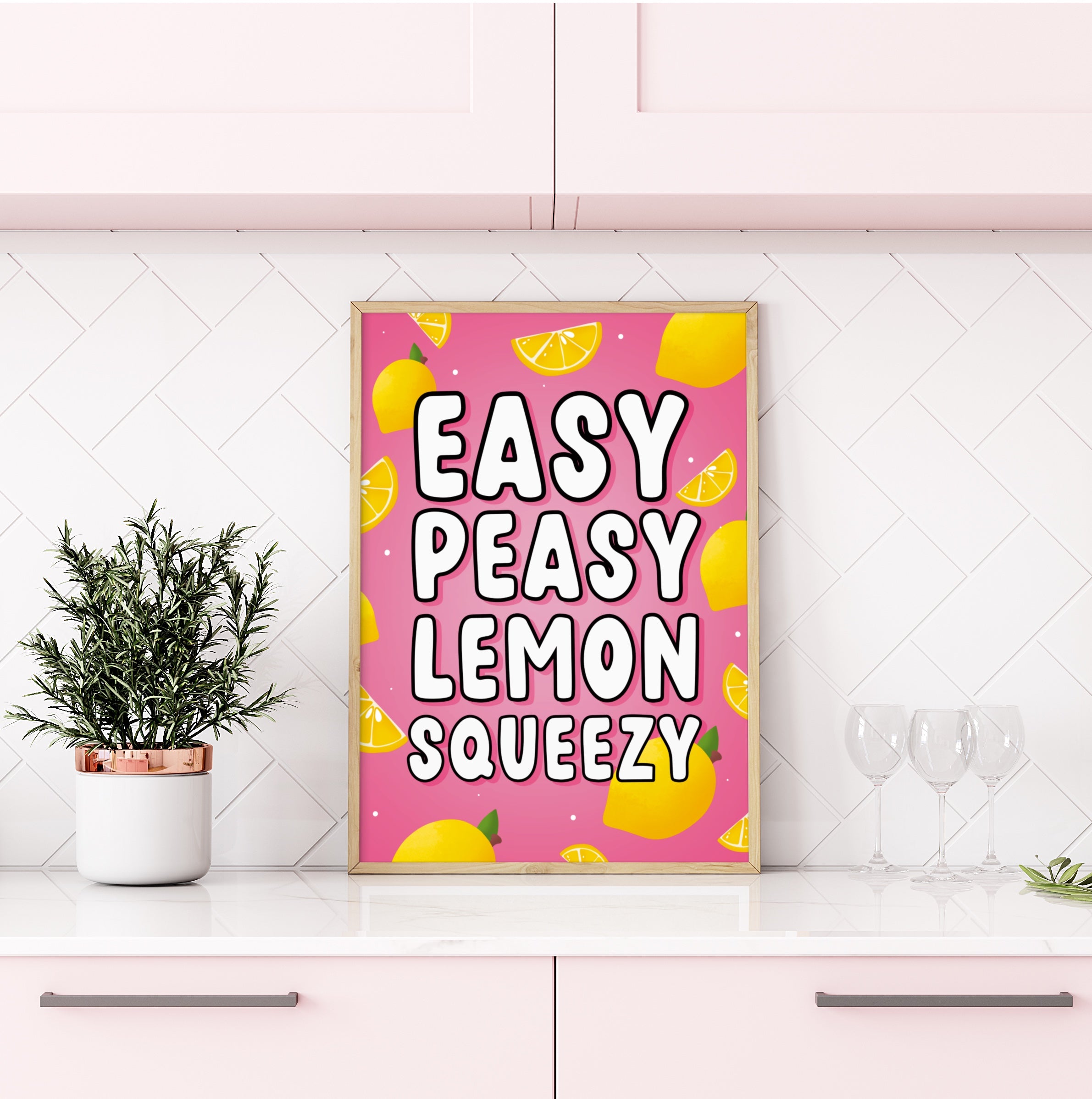 "Easy Peasy Lemon Squeezy Wall Art Print": A playful print with vibrant lemons and the quote "Easy Peasy Lemon Squeezy." Radiates positivity and charm.  "Available Sizes A5 to A3": Three print sizes displayed side by side - A5, A4, and A3. Options for decorating various spaces.