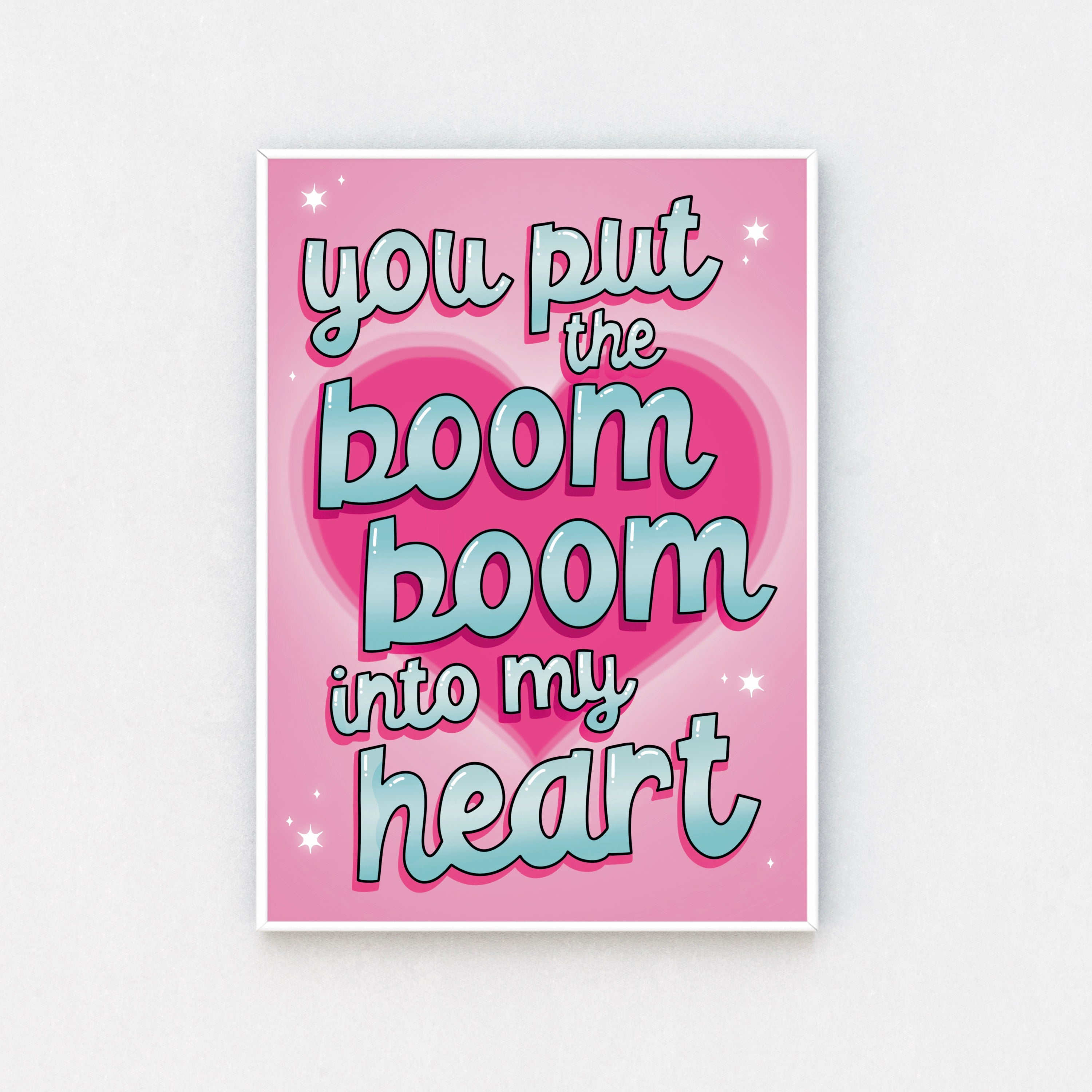 "Framed wall art: Colorful 'You Put the Boom Boom into My Heart' print, a tribute to 80s tunes."