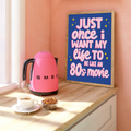 Chic wall art print featuring the quote "Just Once I Want My Life to Be Like an 80s Movie" in pink cursive font on a blue background.