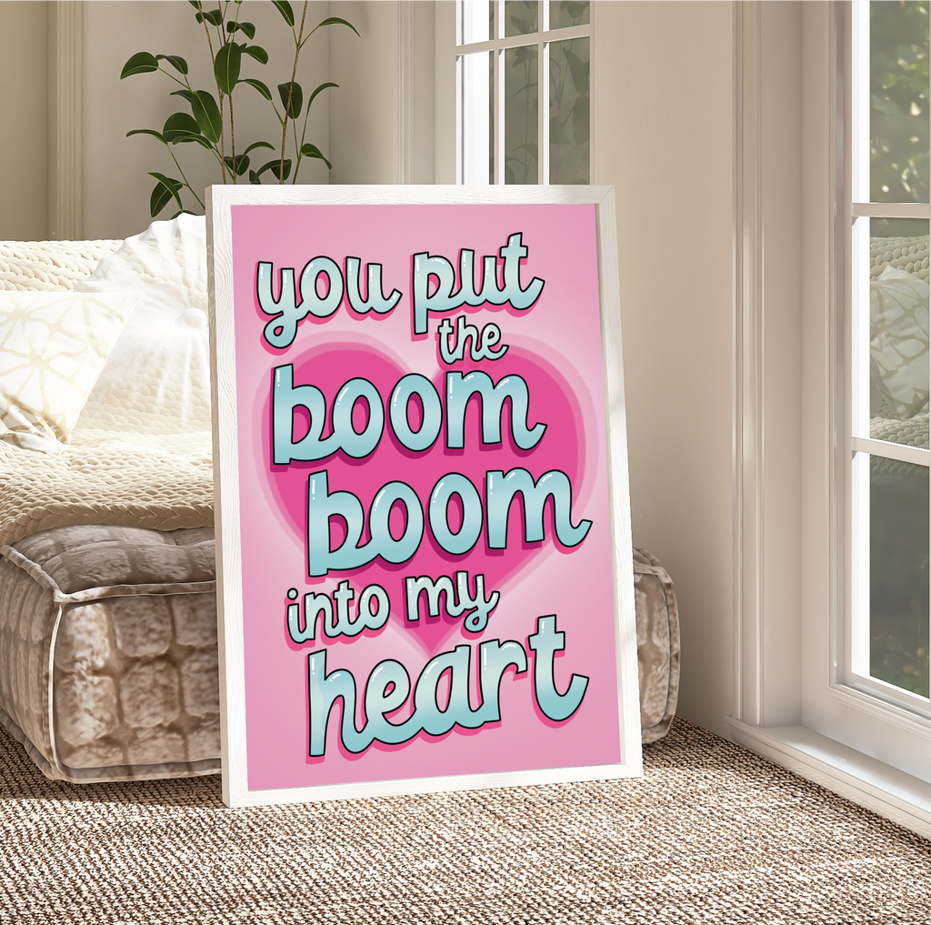 "Framed print: 'You Put the Boom Boom into My Heart' in colorful fonts. Adds 80s vibes to any space."