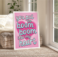 "Framed print: 'You Put the Boom Boom into My Heart' in colorful fonts. Adds 80s vibes to any space."