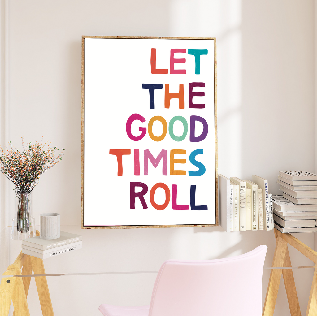 Typography Print in White Frame: Infuse your space with joy with this framed print featuring the quote "Let the Good Times Roll." Against a white background, it's a reminder to embrace life's festivities.