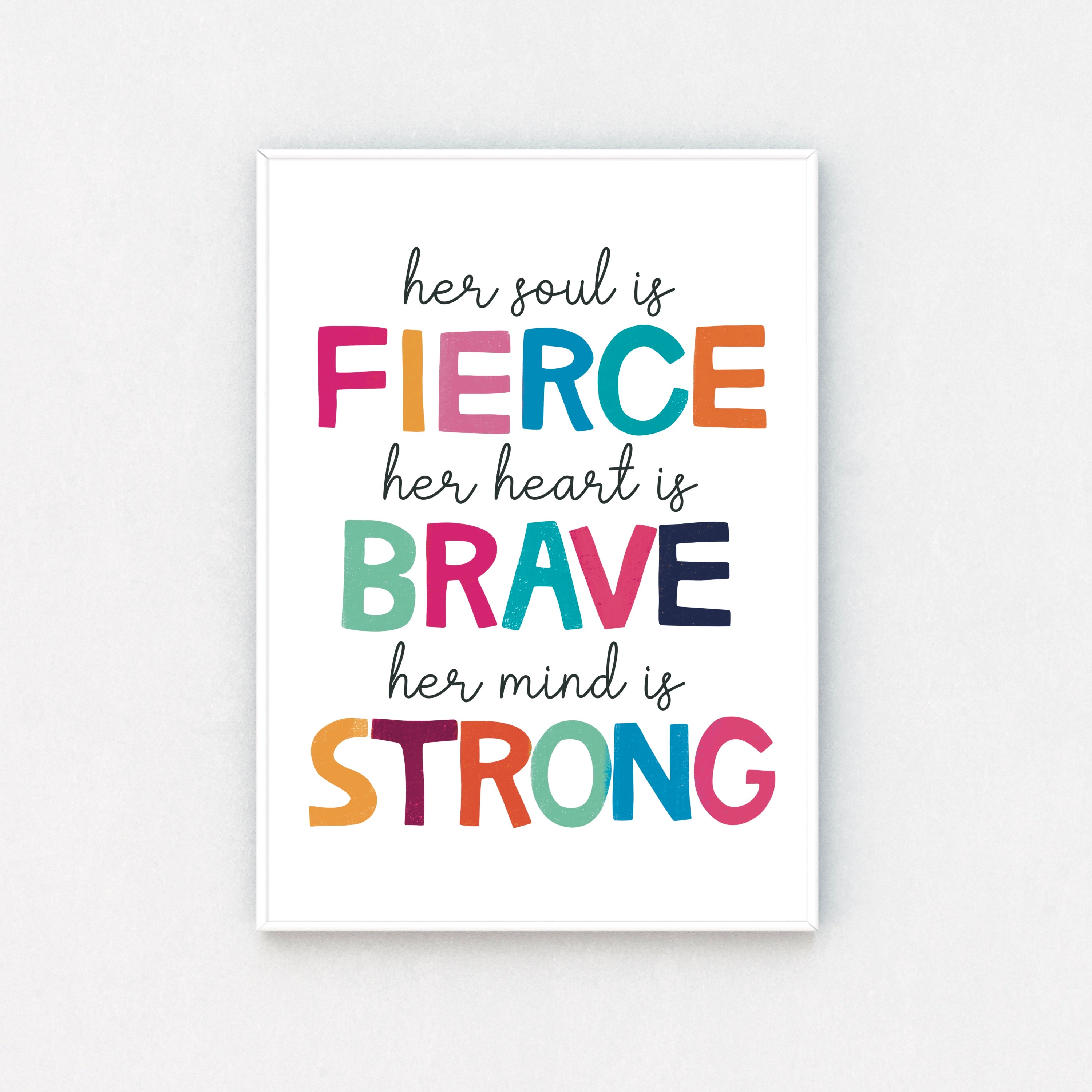 "Framed print: 'Her Soul is Fierce, Her Heart is Brave, Her Mind is Strong' on clean white backdrop, a daily reminder of empowerment."